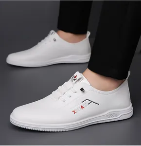 Detailed close-up of white leather casual loafers for men with soft anti-slip rubber sole