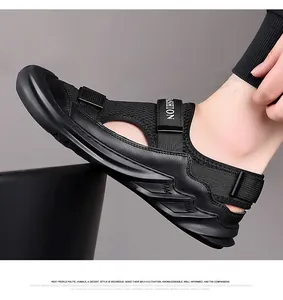 Close-up of black men's outdoor sport sandals with adjustable velcro straps and wave texture