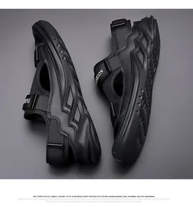 Detail of black sporty sandals featuring breathable mesh and thick anti-slip treaded sole