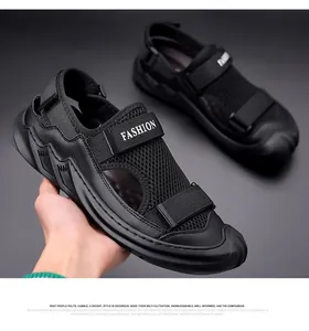 Detail of men's black sports sandals with mesh texture and adjustable fashion straps