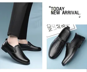 Detail view of black genuine leather slip-on loafers with durable rubber sole
