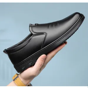 Close-up of flexible men's black leather slip-on shoes with soft soles for driving