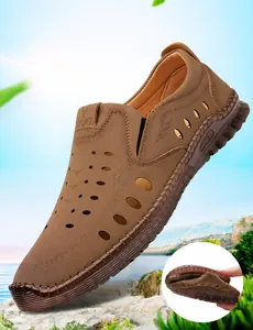 Detail showing flexible soft brown leather upper with breathable hollow out vents on men's sandals