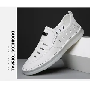 Detail of white hollow leather shoes with woven sole edge and metal CS buckle