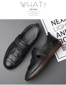 Detail of men's black hollow leather sandals featuring breathable mesh and velcro straps