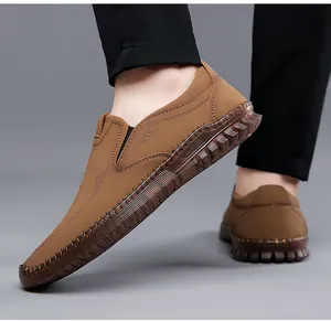 Close-up of brown casual slip-on shoes with textured leather and non-slip rubber soles