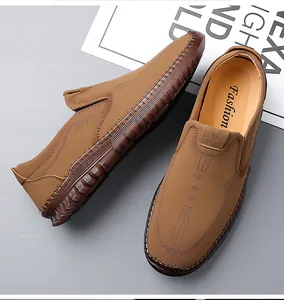 Close-up of brown men's slip-on leather shoes with durable non-slip rubber soles
