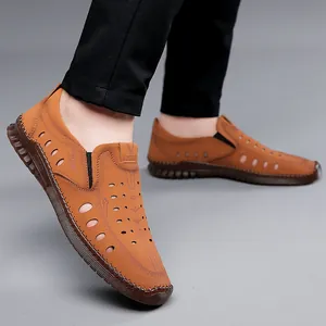 Brown men's hollow leather slip-on shoes with breathable holes and soft rubber sole