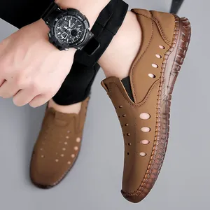 Men's brown hollow leather sandals with breathable laser-cut holes and durable gum sole