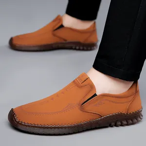 Men's casual slip-on loafers in caramel brown leather with textured sport sole
