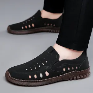 Men's breathable black leather slip-on summer sandals with hollow cut-outs and rubber sole