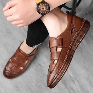 Brown leather men's sandals with breathable woven hollow design and non-slip rubber sole