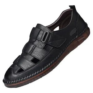 Men's breathable black leather sandals with hollow cut-outs and soft rubber sole