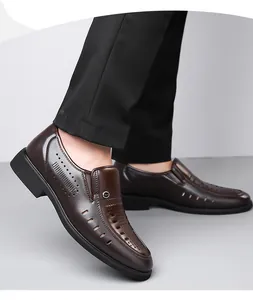 Detailed close-up of dark brown leather loafer with laser-cut hollow breathability holes