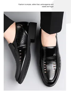 Close-up of black breathable hollowed leather loafers with glossy finish and thick soles