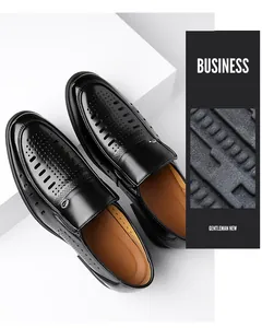 Close-up of black breathable hollowed leather loafer with polished finish and metal buckle