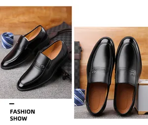 Close-up of black leather business shoes with elegant textures and silver metal emblem