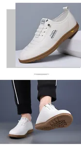 Macro shot of white casual leather shoe with textured synthetic leather and brown rubber sole