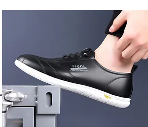 Close-up of black breathable casual leather shoes with thick white anti-slip rubber soles