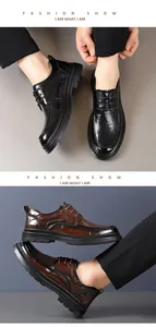 Detail view of brown and black breathable leather dress shoes with woven textures and soft soles