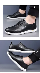 Detail shot of men's black leather casual sneakers with white sole and fashion side branding