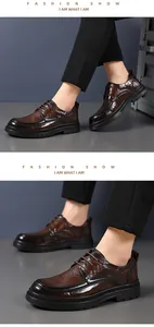 Detail of men's brown brogue leather shoes with perforated texture and rubber sole