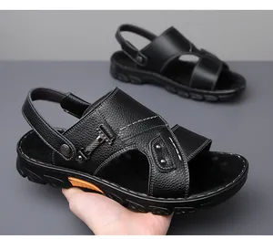 Detail of lychee pattern leather and non-slip rubber sole on men's casual sandals