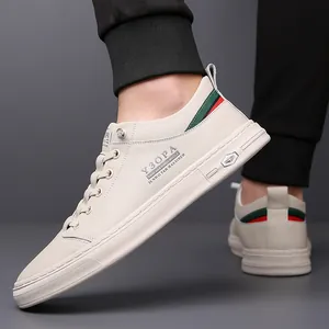 Men's minimalist beige hollowed leather sneakers with trendy red and green stripe detail
