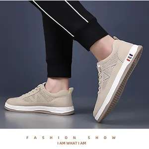 Detail shot of breathable mesh men's sneaker with sporty side stripes and thick sole