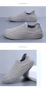 Detail of grey slip-on sneakers featuring 3D textured mesh and side 30PA logo