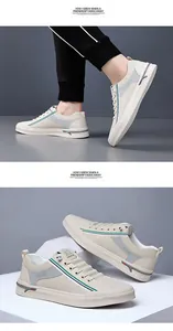 Detail of white mesh breathable sneakers with tri-color stripes and anti-slip sole