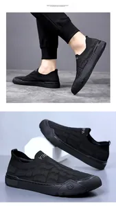 Detailed close-up of black breathable mesh knit slip-on sneakers for men with rubber soles
