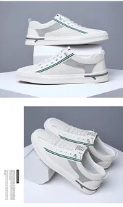 Detailed close-up of white breathable mesh sneakers with blue and green side stripes
