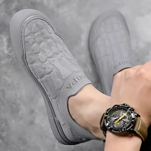 Men's grey slip-on breathable knit sneakers with lightweight soft rubber sole