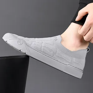 Light grey breathable knit slip-on sneakers with flexible soft soles for men