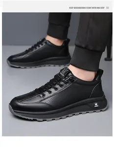 Macro view of men's matte black sneakers showing laser-cut side vents and wave-textured sole