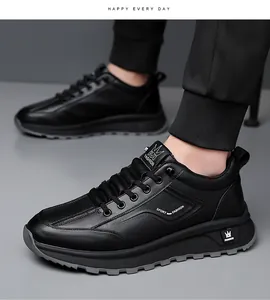 Detail view of black men's sport shoes featuring white fashion lettering and non-slip sole
