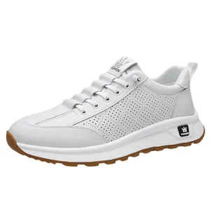 White breathable leather sports sneakers with hollow holes and a non-slip gum rubber sole