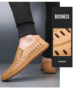 Close-up of hand-stitched details and breathable hollow design on men's leather shoes