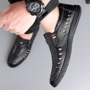 Men's black breathable genuine leather loafers with laser-cut holes and non-slip sole