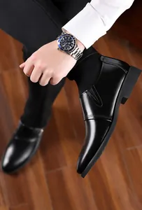 Detail shot of black polished leather British style business shoe with elastic side gore