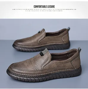 Close-up of brown leather slip-on loafers with durable rubber soles and stitching detail