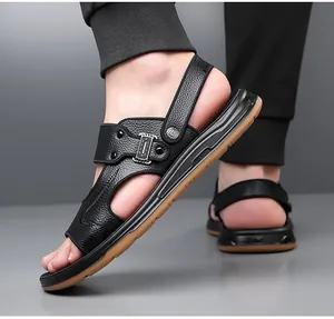 Close-up of black leather men's sandals with dual-use heel strap and anti-slip sole