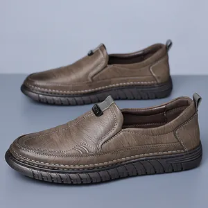 Men's brown leather loafers with thick rubber sole and slip-on design for daily wear