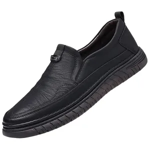 Men's black slip-on leather shoes with fine texture and stylish metal buckle detail
