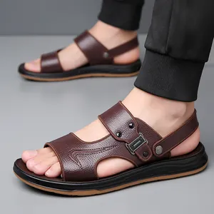 Men's dark brown leather beach sandals with non-slip sole shown on feet in a side view