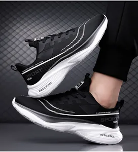 Detail view of breathable black mesh sneakers with thick white shock-absorbing soles
