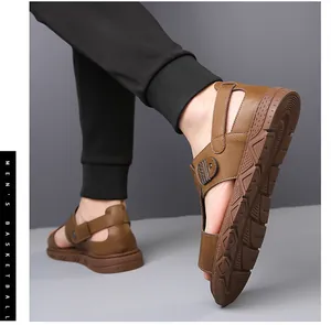 Detail view of men's brown leather sandals with adjustable straps and thick rubber sole