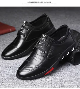 Détail de chaussures en cuir noir pour hommes avec accent rouge et logo Sport