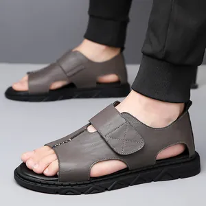 Heren strandsandalen van donkergrijs leer met klittenband en antislip rubberen zolen